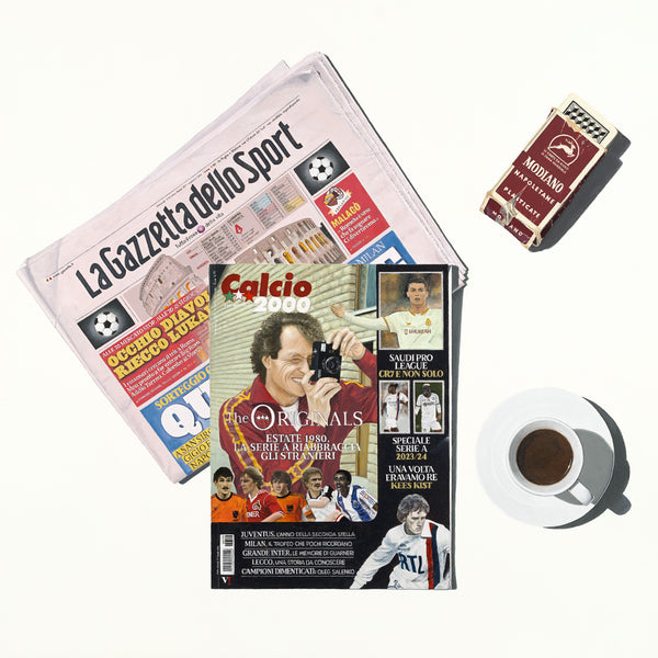 Magazine cover with sports theme, italian sports newspaper, la gazzetta dello sport, espresso coffee cup, and Modiano scopa cards on a white background
